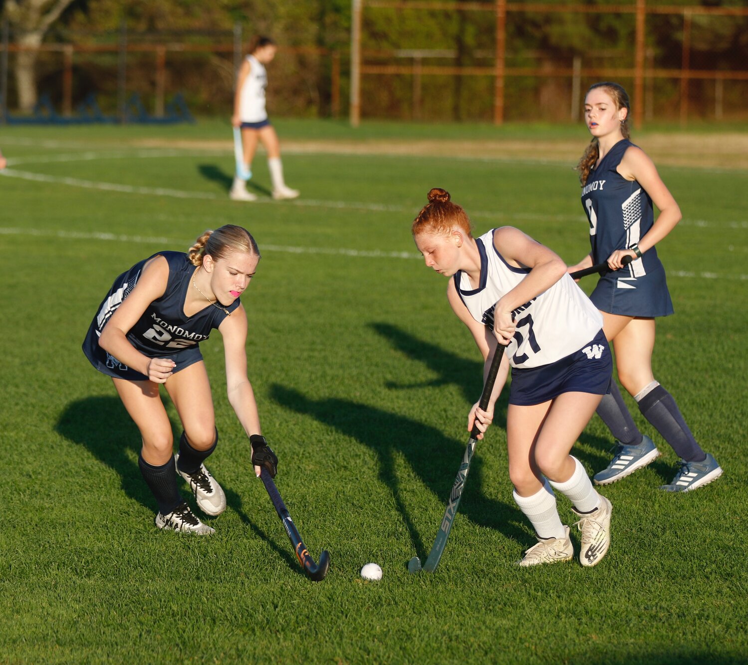 Evie Phelps, right, and a Monomoy player battle for a loose ball during the Whalers’ 6-0 win Oct. 4.