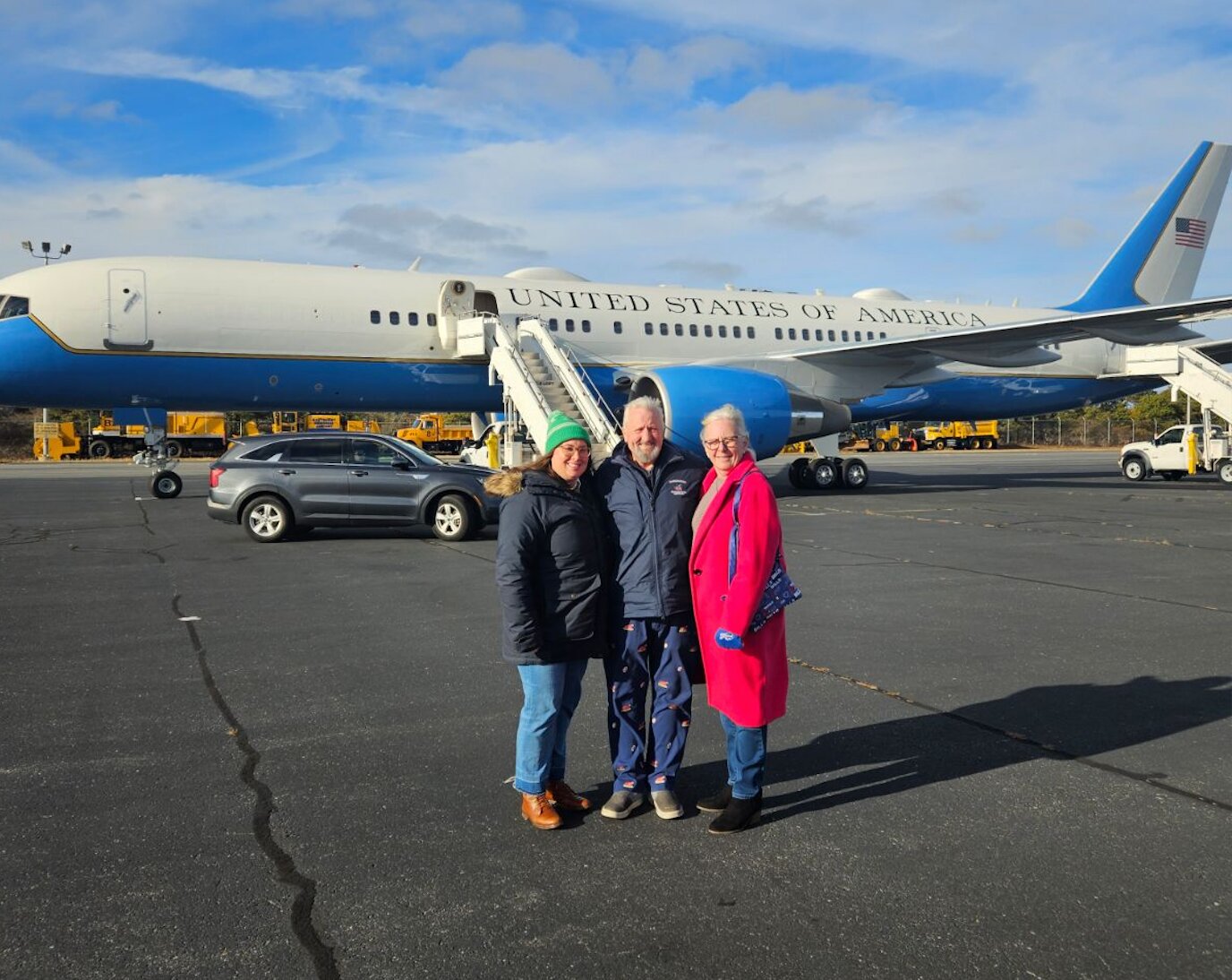 Faregrounds Restaurant owners Bill and Kim Puder and their niece Sharon in front of Air Force One Sunday.