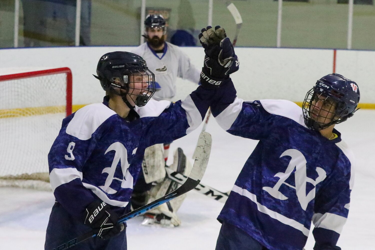 The NHS varsity boys hockey team faced off against alumni Saturday afternoon at Nantucket Ice.