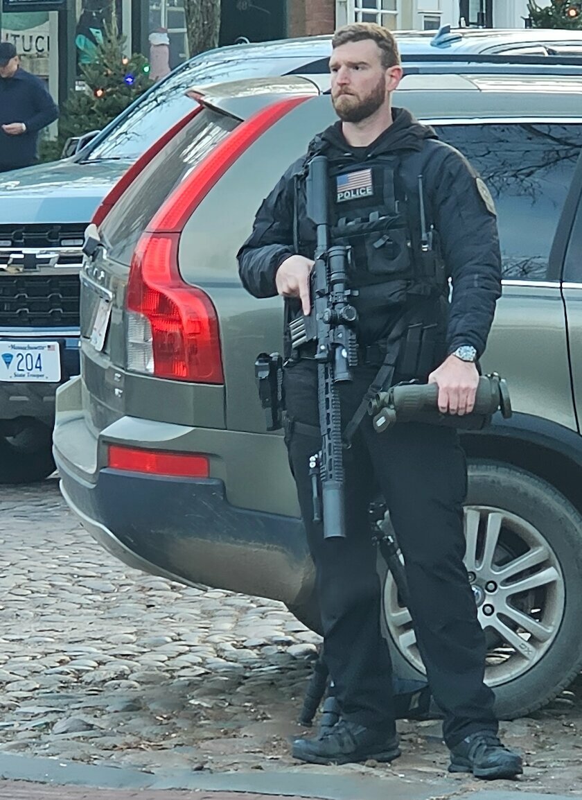 A heavily-armed member of the Secret Service downtown Saturday.