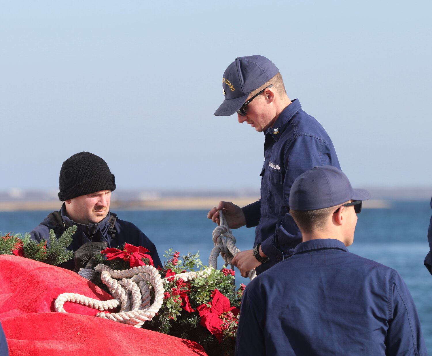 Members of U.S. Coast Guard Station Brant Point hung the wreath on Brant Point Light Thursday afternoon.
