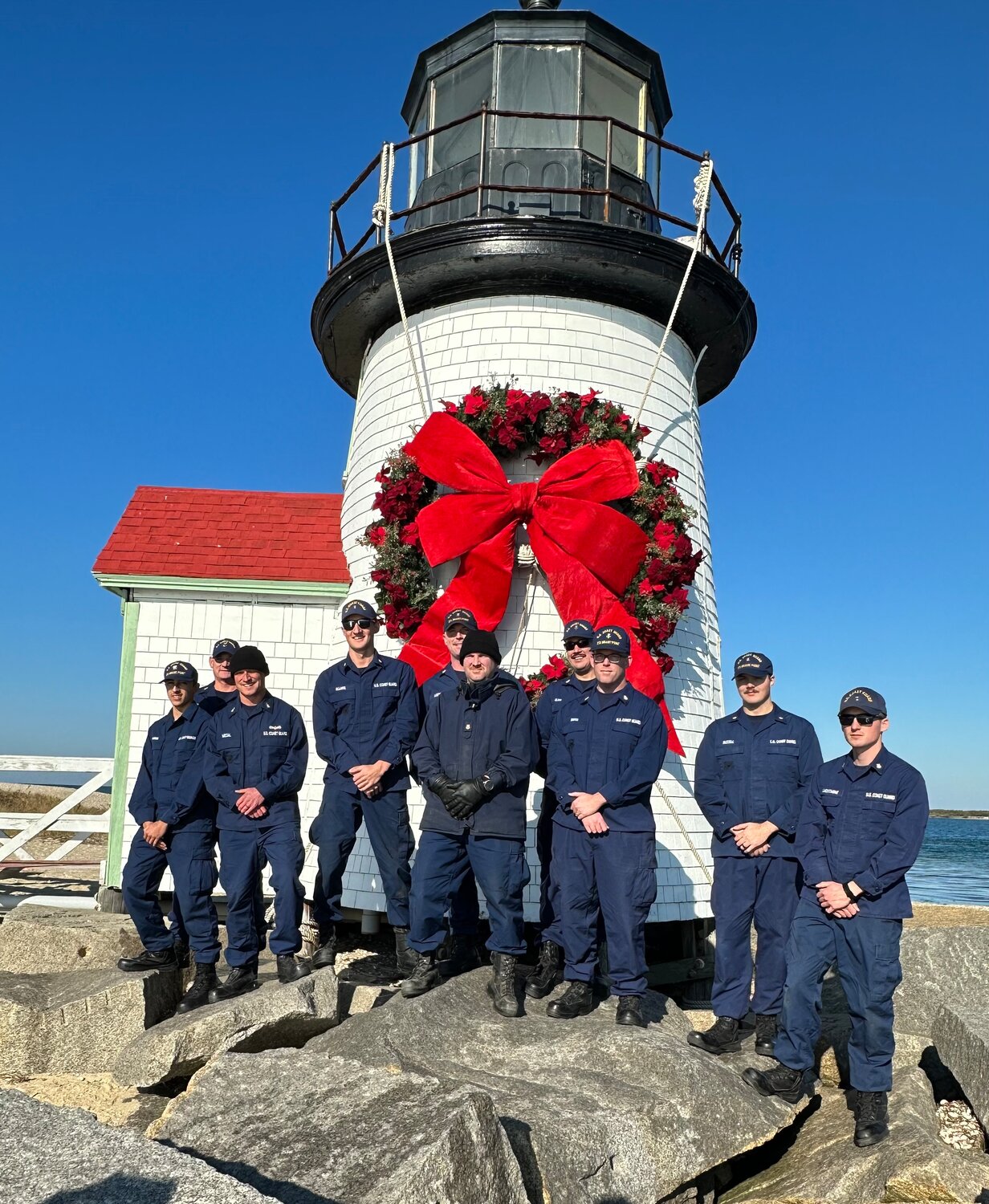 Members of U.S. Coast Guard Station Brant Point hung the wreath on Brant Point Light Thursday afternoon.