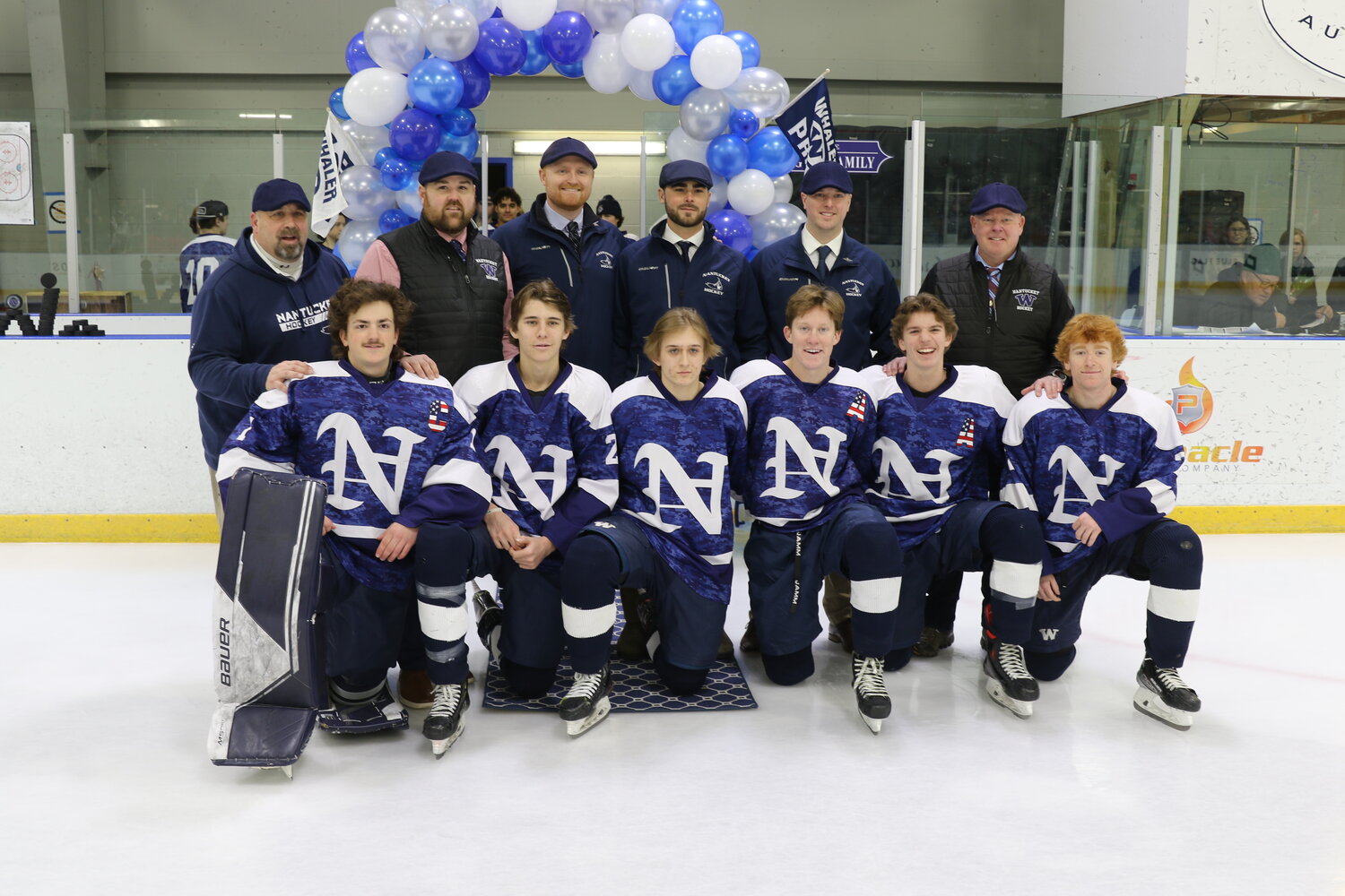 The Whalers seniors and coaching staff ahead of Sunday's 5-0 win over Monomoy/Mashpee. Front row, from left: Griffin Starr, Braden Knapp, Hunter Strojny, Mike Culkins, Ryan Davis and Colby O'Keefe. Back row, from left: Ray Patrick, Bryan Larivee, Chase Colasurdo, Mike Howard, Jack Moran Jr. and Jack Moran.
