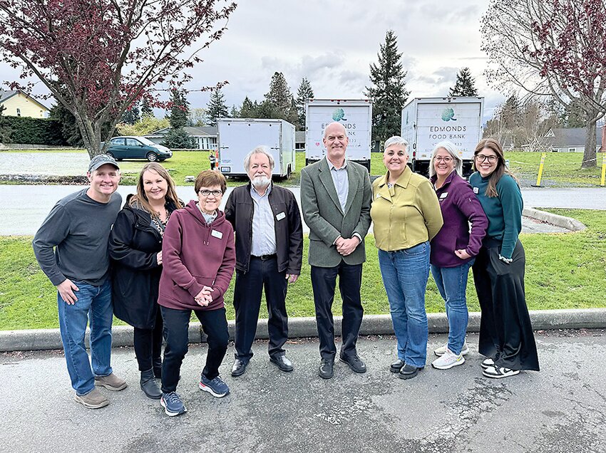 Pictured: Jeremy Peck (director of development), Mindy Woods (Human Services, City of Edmonds), Kathy Hare (board secretary), Pat Shields (board chair), Rep. Rick Larsen, Casey Davis (executive director), Tracey Peterson (SNAP manager and executive assistant), Kellie Lewis (marketing and communications manager).