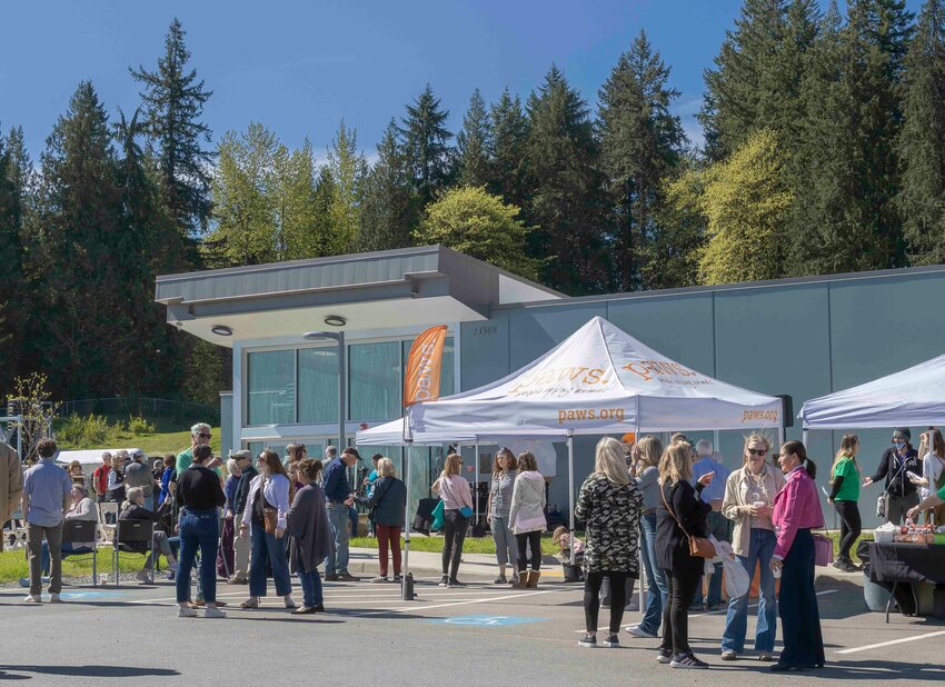 Heidi Wills Yamada speaks to 300 visitors to the new PAWS Wildlife Rehabilitation Center for the April 20 opening of the 25-acre campus located south of the city of Snohomish.