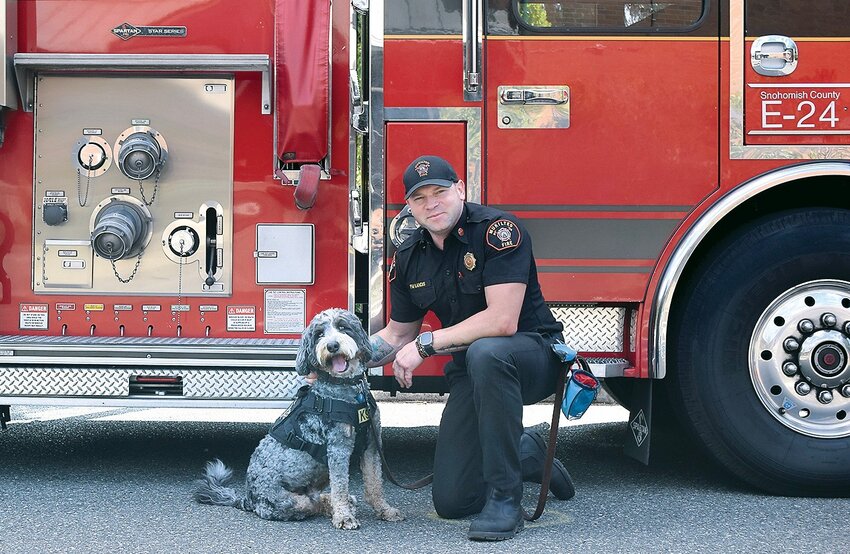 Mukilteo Fire Marshal Derek Landis works on training with Amani every day.