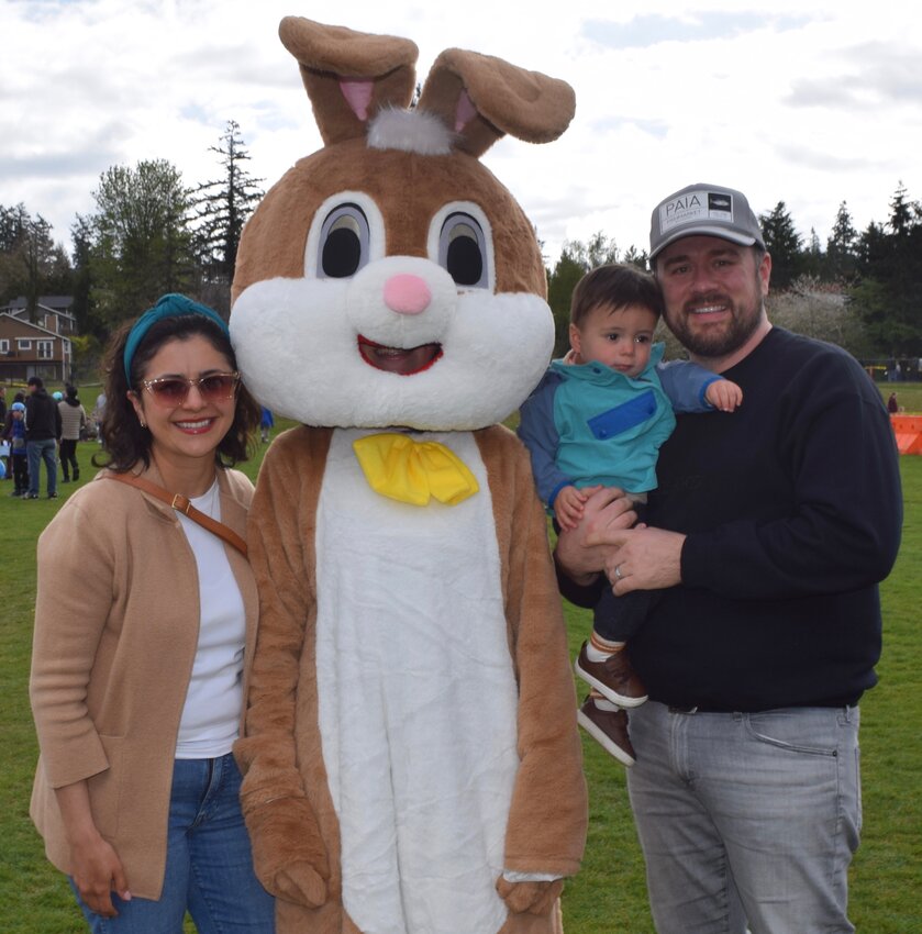 A young boy waits for the start of the Easter egg hunt.
