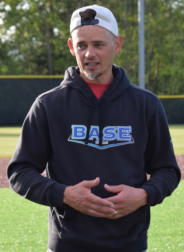 Jackson graduate Brent Lillibridge, speaking to some Jackson and Kamiak baseball players after a game, is one of four athletes to be inducted into the Snohomish County Sports Hall of Fame this year.