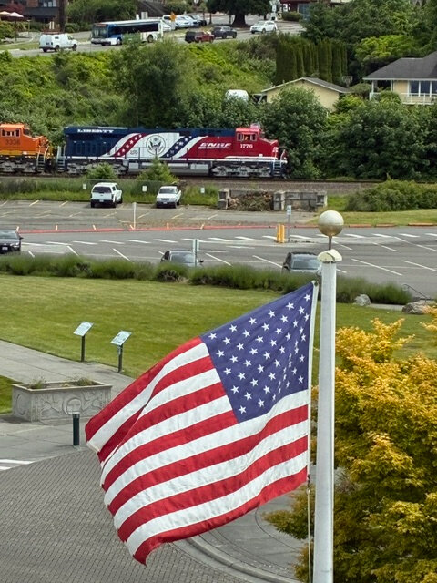 Specially painted locomotive passes through Mukilteo