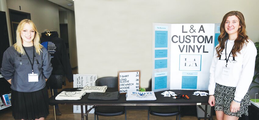Ava Wiles (left) and Lynelle Gengler earned a first place with their L&A Custom Vinyl business, during the Entrepreneurship Challenge. They also won the Best Overall Marketing and the Public Choice awards, taking home a grand total of $1,000 among the three categories. 