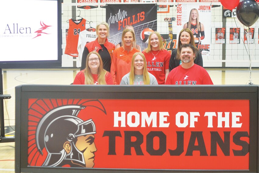Beloit senior, Jaidyn Follis, signed with Allen Community College, on Feb. 25, 2025, at the Beloit High School gymnasium. She is supported by, from left to right, front row: Courtney Follis (mom), Jaidyn, Clayton Follis (dad). Back row: Beloit High School Assistant Coach, Stephanie Litton, Head Coach Brandy Paul, Kaitlyn Follis (sister), Assistant Coach Josie Burke.