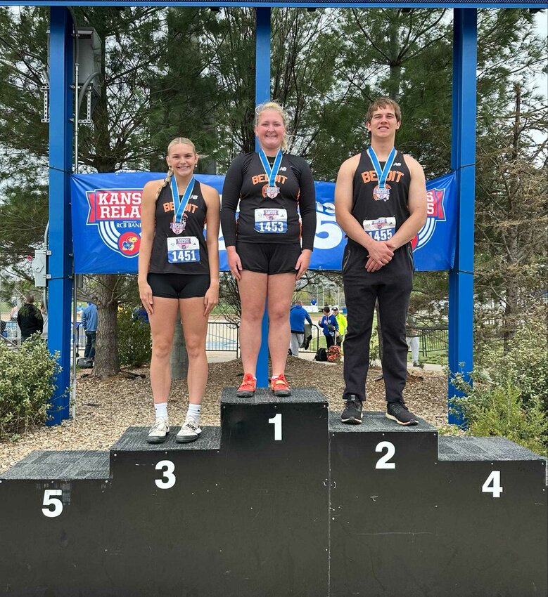 From left to right: Addison Budke, third place in the shot put with a throw of 42’5.25”; Tatum Seyfert, first-place shot put throw of 45’3.75”; third place discus with a throw of 141’9”; Eli Johnson, second in discus with a toss of 187’0” and earned fifth place in the shot put (57’6.25”).