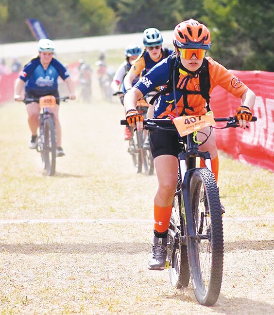 Abby Rigney charges out of the chute at the beginning of her race at Fancy Creek State Park. 