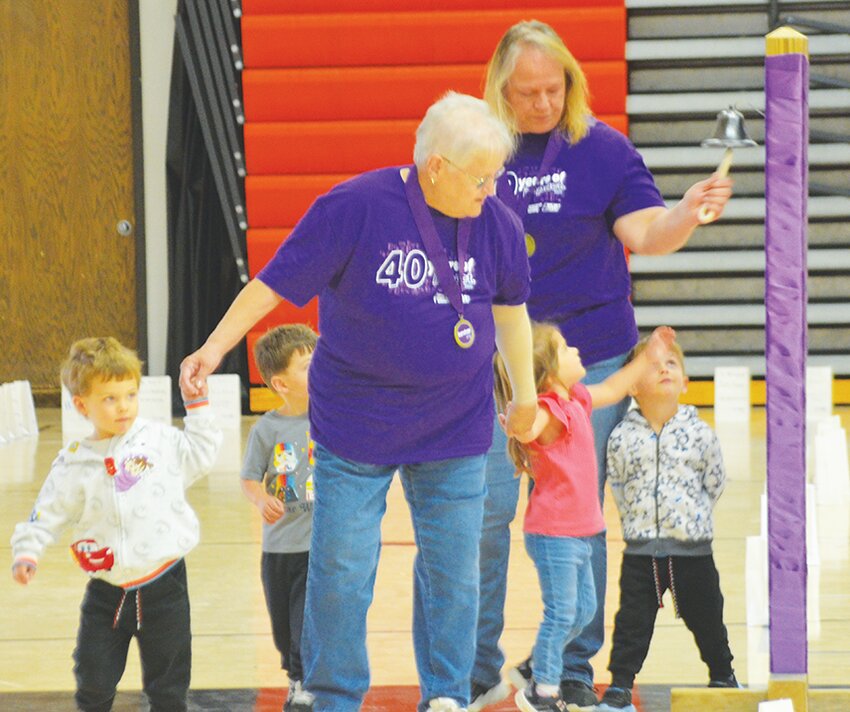 A bell presented by Ken Benedick, provided Cancer survivors a time to ring the bell, during the Survivor lap, at the Beloit Relay for Life event, held on April 26, 2025, in Beloit. Daughter Cande Staniec rings the bell after her mom, Susan Woods, as she is helped and supported by her great quadtruplet grandbabies, Nash, Maverick, Everleigh and Owen.
