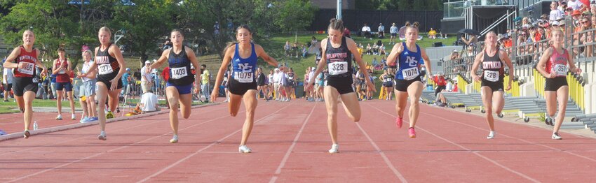 Clifton-Clyde's Sevy Wurtz (fifth from the left) running in the 100m dash prelims.