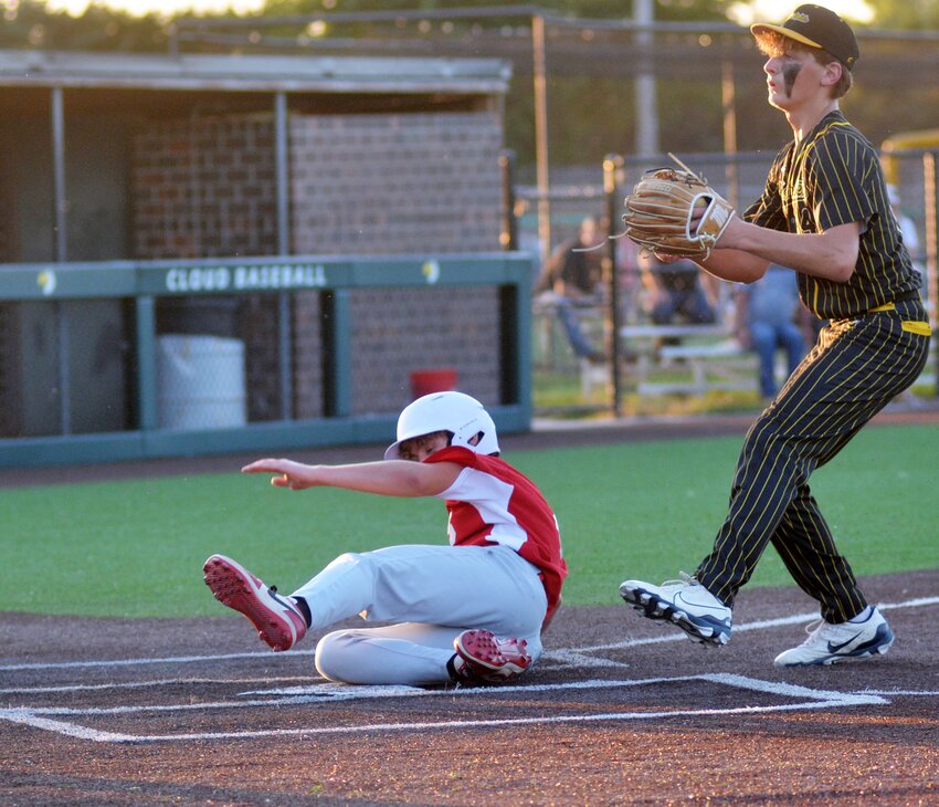 CNB’s Daniel Kemling stealing home to tie the game in the sixth inning versus Valley Heights.