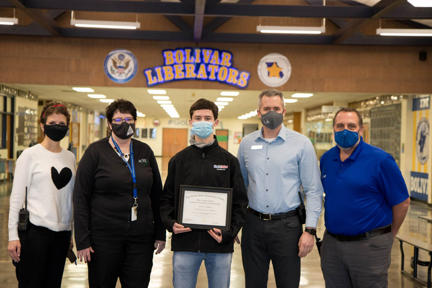 From left, BHS assistant principal Michelle Darby, BoMO Works coordinator Betty Glasgow, 2020 graduate Quenton Hoffman, principal David Geurin and assistant principal Ron Owens celebrate Hoffman&rsquo;s completion of the U.S. Department of Labor's Apprenticeship Certificate.&nbsp;