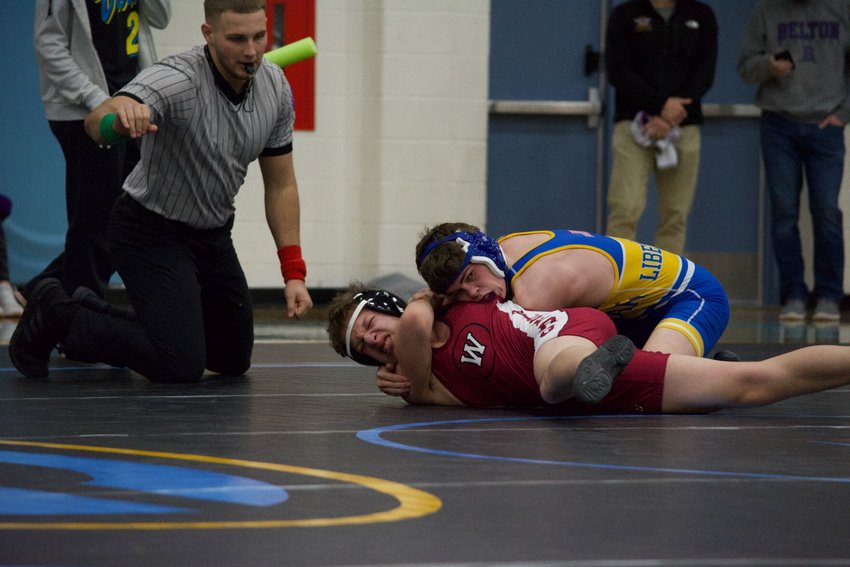Bolivar&rsquo;s Jake Banner works to pin an opponent during the Class 3 District 7 meet on Saturday, Feb. 13.&nbsp;