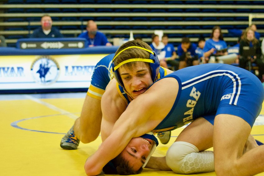 Bolivar senior Canyon Hunningham battles Carthage&rsquo;s Bradyn Tate at Bolivar&rsquo;s duel with the Tigers on Thursday, Jan. 14.&nbsp;
