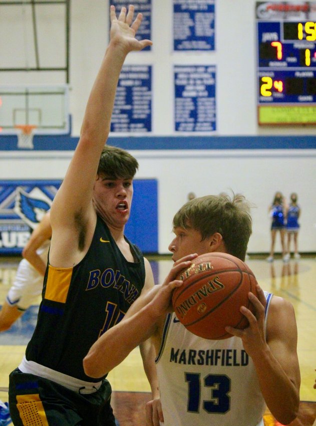 Bolivar&rsquo;s Cooper Cribbs works on defense to shut down Marshfield&rsquo;s passing game during Bolivar&rsquo;s win over the Blue Jays on Tuesday, Jan. 12.&nbsp;