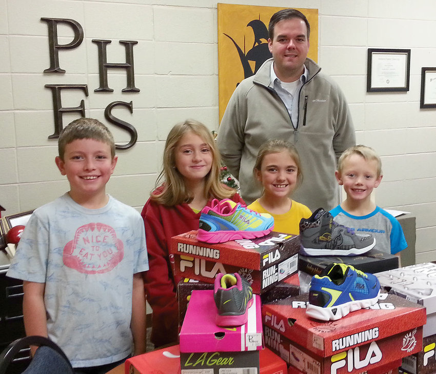 Rotary Club donates shoes Bolivar Herald Free Press