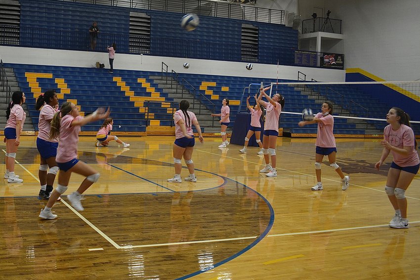 Bolivar&rsquo;s C-team tosses the volleyball around before its match against Lebanon, the girls sporting Heidi Williams&rsquo;s breast cancer awareness shirts.