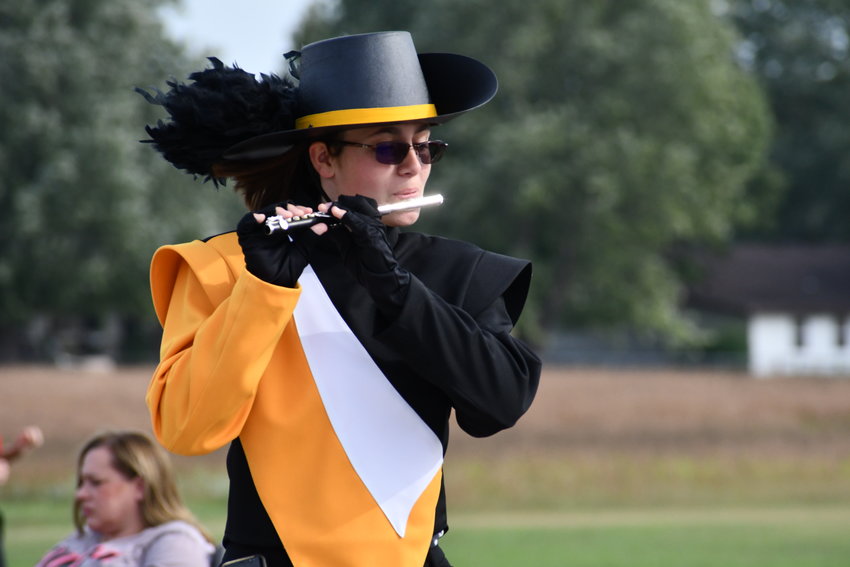 Lily Altic on the flute marches with the Pleasant Hope Pirate Power Band.