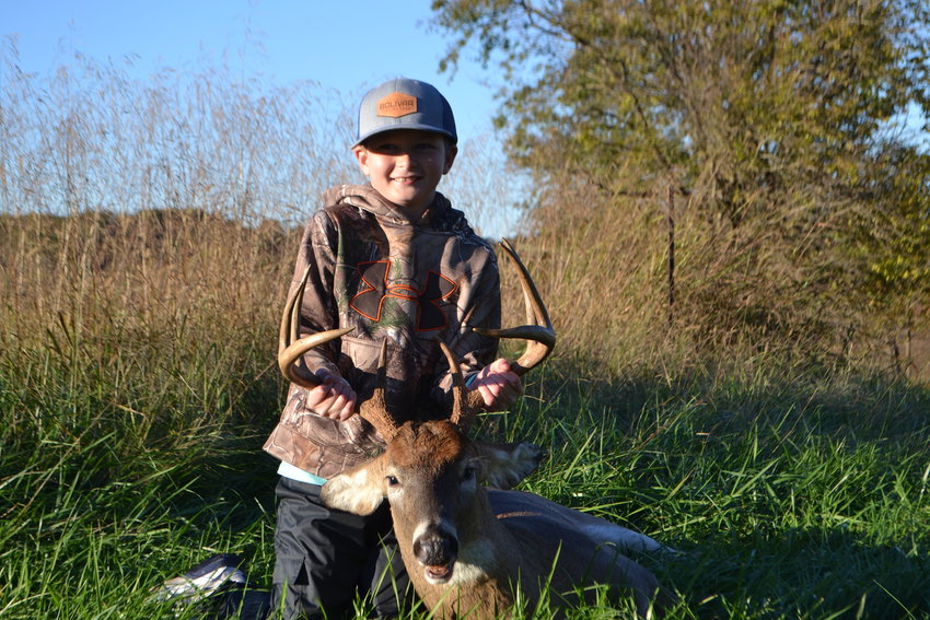 Fisher Williams, 11, poses with his 8-point buck on Saturday, Oct. 30. Fisher scored his buck while hunting north of Bolivar.