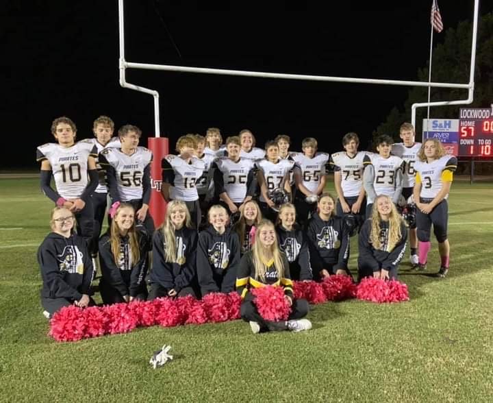The Pleasant Hope junior varsity football team poses with the school&rsquo;s cheerleading team.