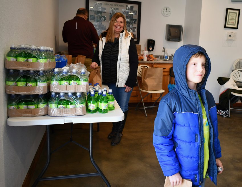 Pictured here, Kaden Carnes leaves with a smile on his face after picking up his lunch from Lisha Mauck on Wednesday.