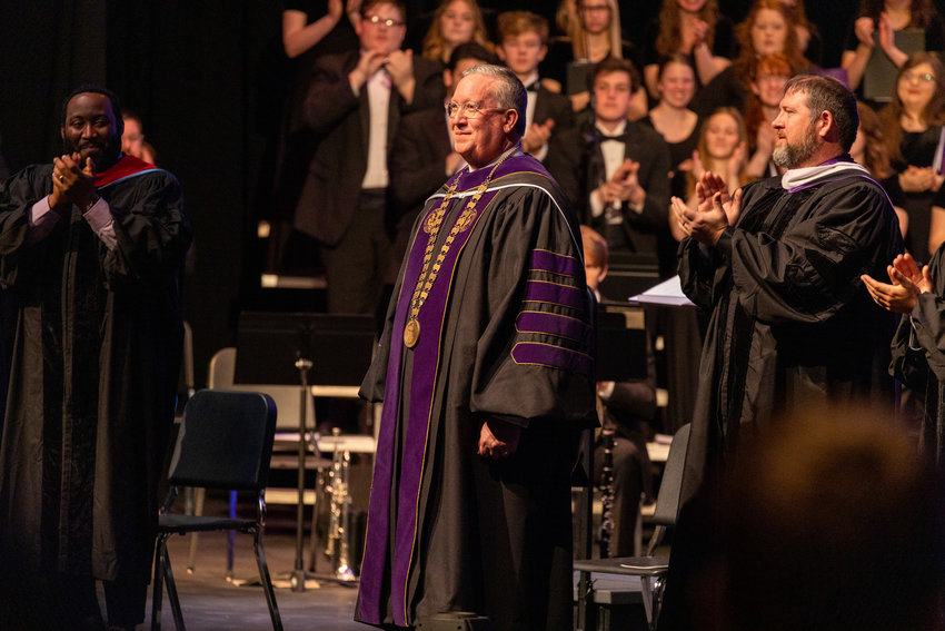 Dr. Richard J. Melson, center, is presented as SBU&rsquo;s 26th president at the Inauguration Ceremony. Also pictured is Bolivar mayor Chris Warwick, at right.