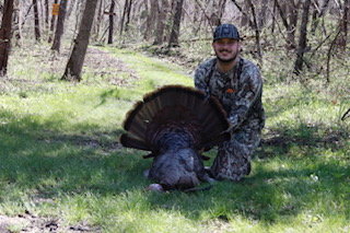 Shawn Wood is pictured here with the turkey he harvested on Friday, April 22.