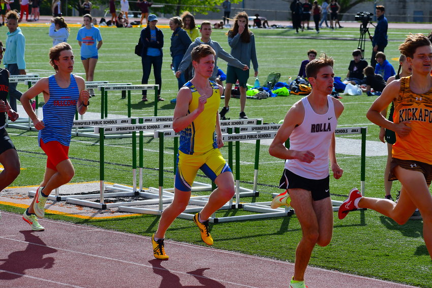 Senior Cale Thiessen runs to a personal record in the 1600-meter race during the Ozark Conference meet.