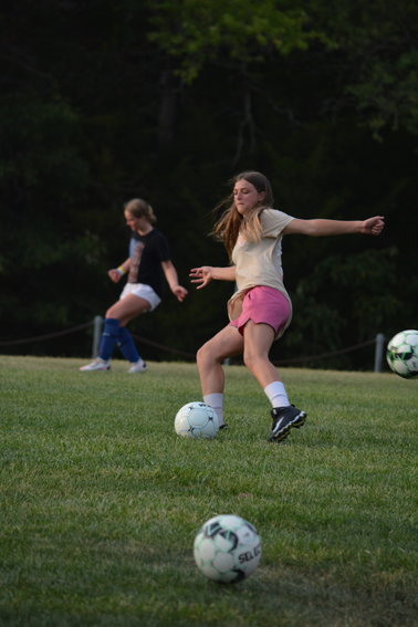 Adrianna Lilly aims for a powerful kick.
