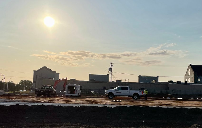 After a little cool down over the weekend and bringing some much needed moisture, the sun is back heating up the days. Construction workers at the Flat Creek work site get an early start.