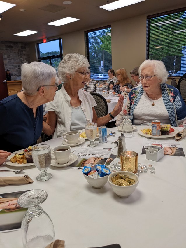 A good time to socialize, Rosie Meyer (middle) introduces Dixie Barber (right) to Maureen White (left) at the CMH Breakfast Club event.