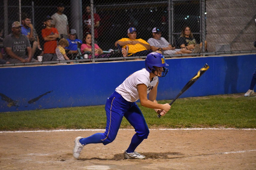 Riley Ross watches as the ball goes into the field in the game against the Cassville Lady Wildcats.