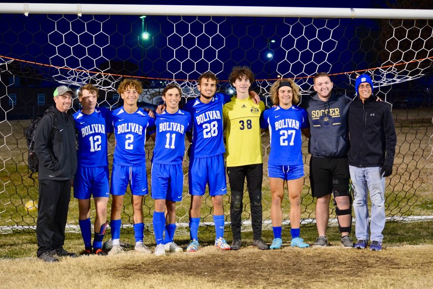 Liberator soccer coaches and seniors (left to right): Coach Steve Fast, Jason Poterbin, Jacob D'Agostino, Colton Rowe, Colten Yockey, Trenton Arnold, Jaren Cleveland, Zach Warwick, and Coach Jeff Edge. (Not pictured: Caleb Simpson)
