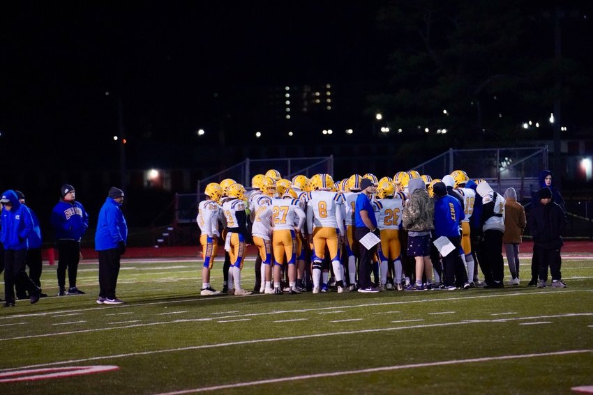 The Liberators came together after a hard game in unpleasant conditions, bringing a close to the season.   CONTRIBUTED PHOTO/DIANA LESH