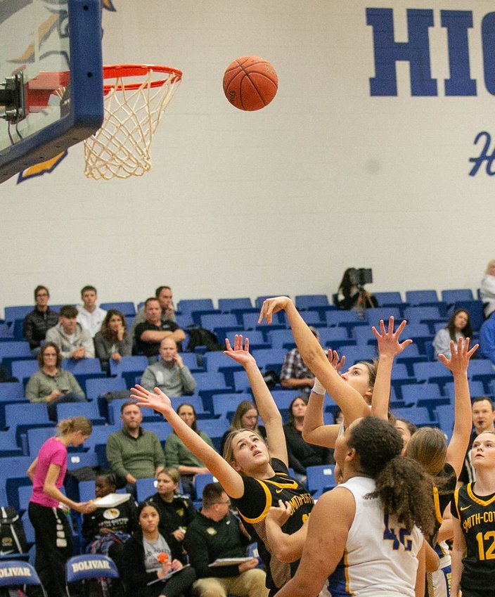 Liberator's Cora Roweton #55 introduces the Tigers to her jump shot.   STAFF PHOTO/BOB CAMPBELL