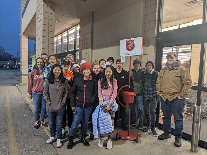 On Thursday, Dec. 8, Wellspring Baptist Fellowship youth group gathers in front of Woods Supermarket to sing Christmas carols and ring the bells for the Red Kettle Campaign. Sign-up for bell ringing can be done at bolivarcom.org/bellringing.