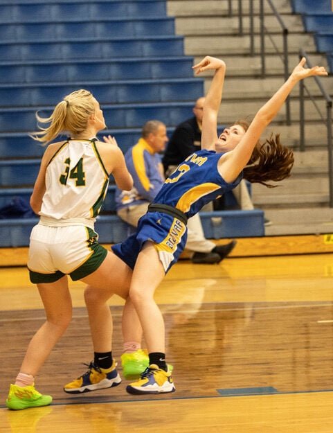Lady Liberator Carly Cribbs found the Viking defender immovable this time.   STAFF PHOTO/BOB CAMPBELL
