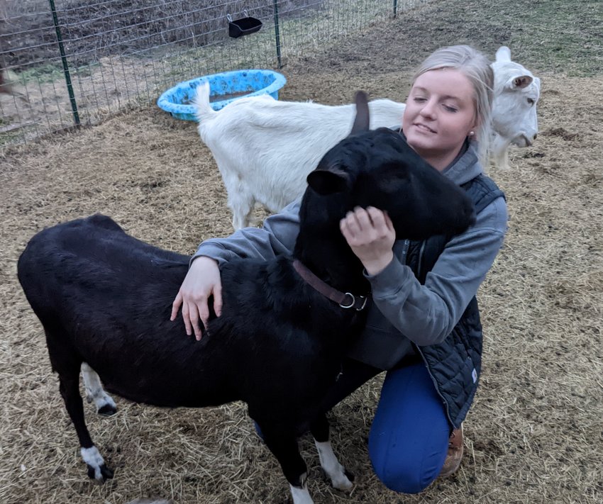 Just a girl and her goats, Shaelyn Jones gives special attention to her pal Ottis, who she says is &ldquo;probably the sweetest one of them all.&rdquo;
