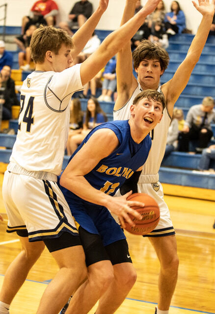 #12 Liberator Kyle Pock looking for a way up to the basket.   STAFF PHOTO/BOB CAMPBELL