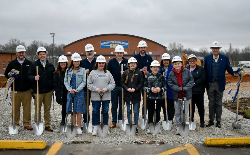 Pictured front row left to right: seventh-grader Jarah Anderson, eighth-grader Maisie McCullah, sixth-graders Lillian David and Hayden Holt, and seventh-grader Asher Mauck.   Back row left to right: Zach Julien, BMS assistant principal; Ben Potter, BMS principal; school board members, Jeralen Shive, Brandon Van Deren, Jared Taylor, Kyle Lancaster, Paula Hubbert, Keri Clayton; and Dr. Richard Asbill, superintendent.   STAFF PHOTO/LINDA SIMMONS