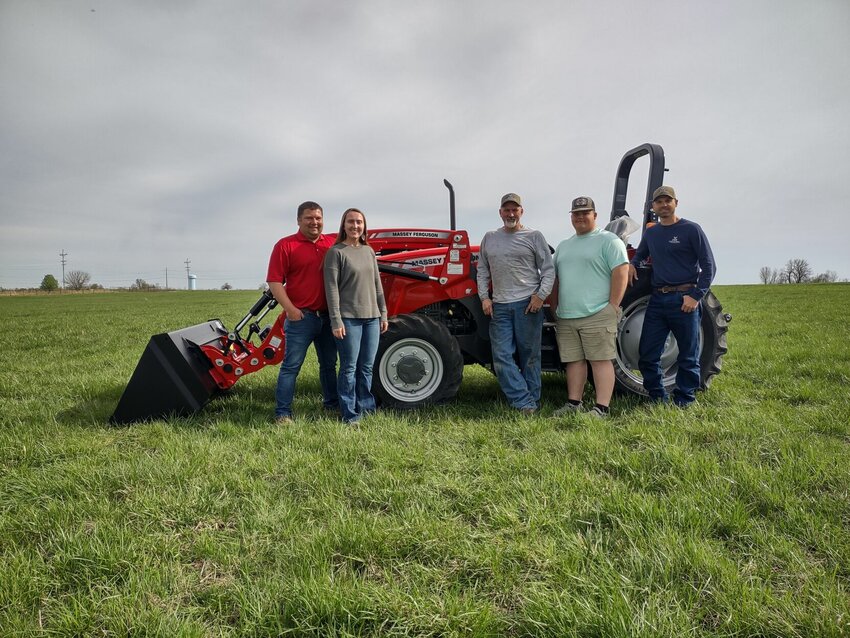 RBW Agricultural LLC staff stand with a Massey Ferguson 2604H tractor. They are, from left, Raymond Winfrey, Britta Winfrey, Darrell Waite, Ty Davis and Jared Geigley.