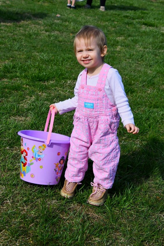 Virginia Willis, 2, is ready with her Easter bucket to take home lots of candy from the Jag Easter Egg hunt on Saturday, April 8   STAFF PHOTO/LINDA SIMMONS