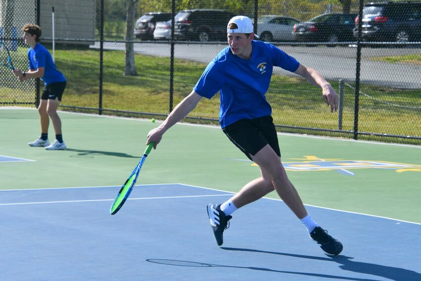 Pock looks to recover after hitting a backhand.   STAFF PHOTO/LINDA SIMMONS
