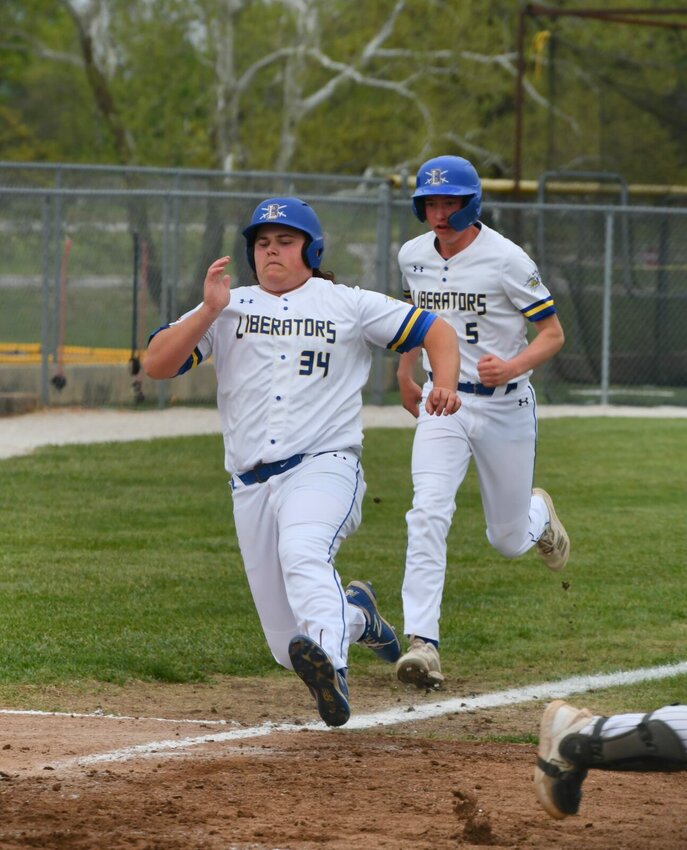 Scoring back-to-back, #34 Brant Sawyers and #5 Kanyon DeGraffenreid crossed home plate to bump up the Liberator score during the 6th inning of the Friday, April 28 game.