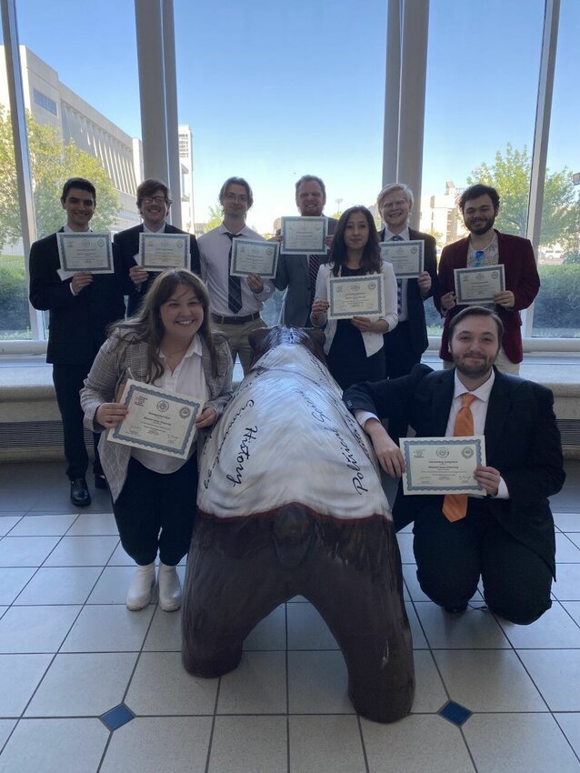 MSU students display their awards after participating in the Model Arab League.